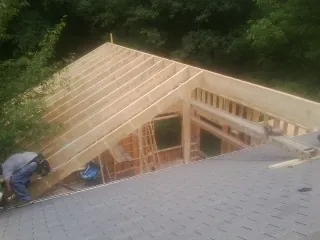 Framing a new roof addition that ties into an existing shingle roof in Chino Hills