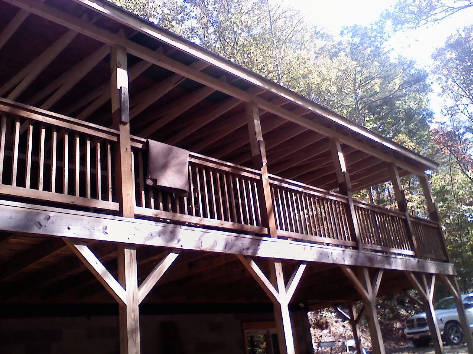 Timber framing under a new elevated porch and deck — Roof Leak Repair in Chino Hills by Roofing Brothers
